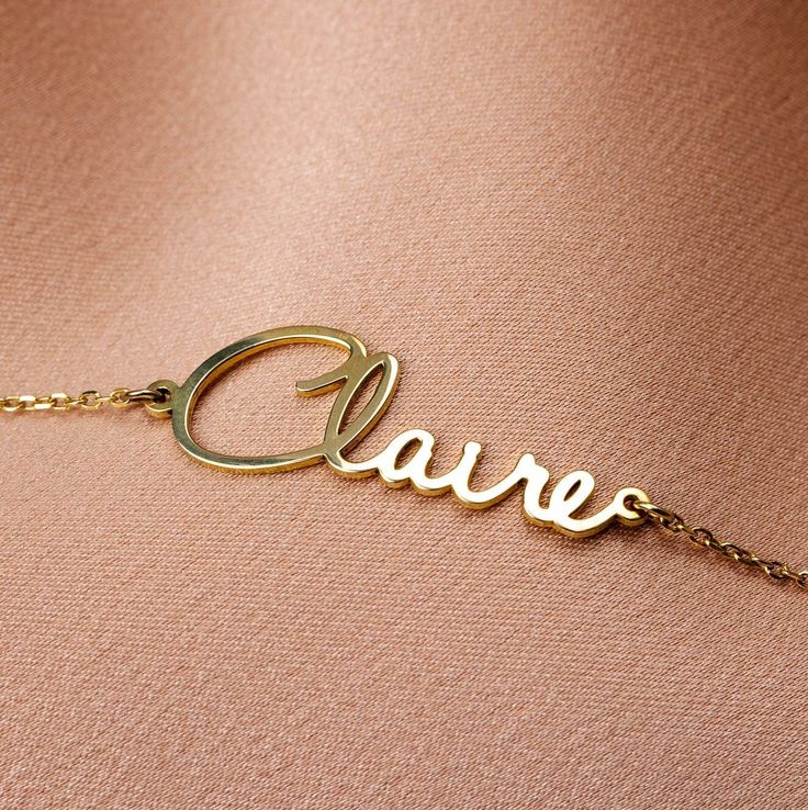 "Personalized name bracelet in sterling silver or in 14K solid gold. A custom bracelet and a great choice for a customized Christmas gift for her! NAME BRACELET F E A T U R E S * Metal: High-quality Sterling Silver 925, 14K Gold, 14K Rose Gold, 14K White Gold * Length: Approx 6\" + 1\" addon chain / total 7\"  (18cm) * Featured font 8 * Dimensions: for Claire 25mm x 8mm.  The dimensions may vary depending on the characters of the name Sterling silver parts of the jewels are gold plated or rhodium plated in order to be strong, durable and resistant to tarnish. 100% nickel free. Delivered in an elegant gift package. H O W * T O * O R D E R Choose from the drop-down menus the available options (Finish, Font Style).  H O W * T O * P E R S O N A L I Z E At checkout, please put in the note box t Customised Birthday Gifts, Valentines Day Gifts For Her, Bridesmaids Personalized, Name Bracelet, Custom Bracelets, Christmas Gifts For Her, Birthday Gifts For Her, Elegant Gift, Chain Link Bracelet