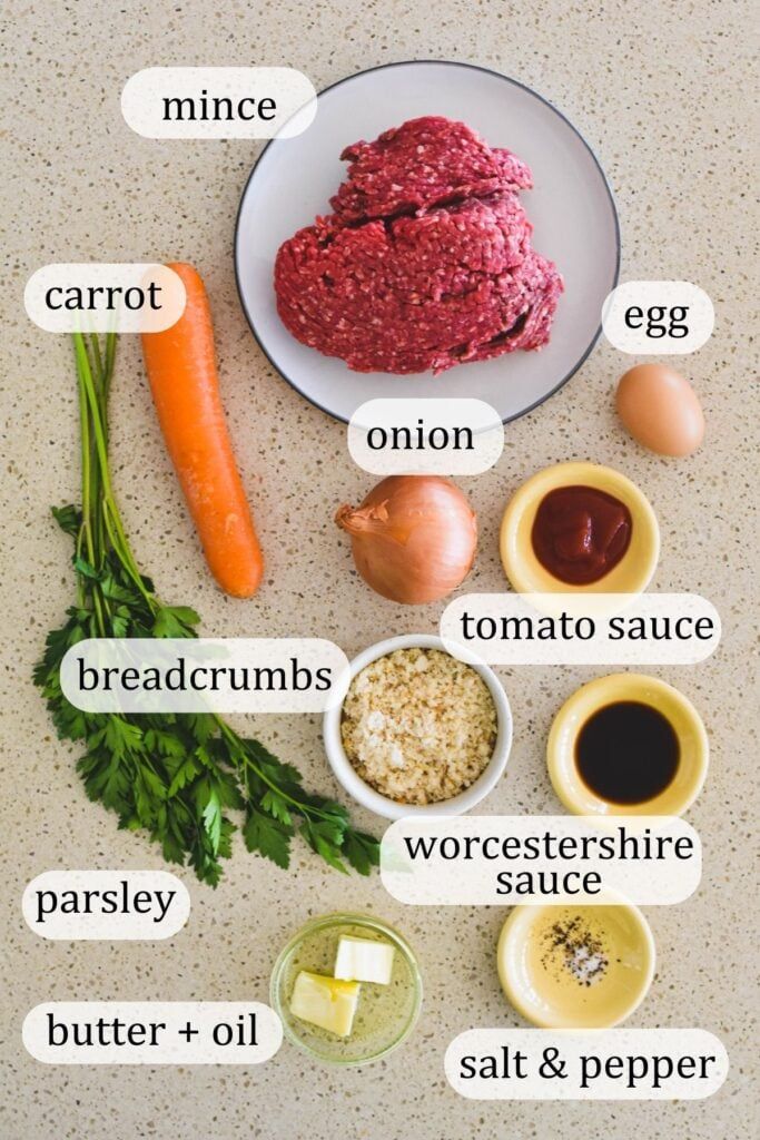 an image of food labeled in english on a table with eggs, carrots, broccoli and other ingredients