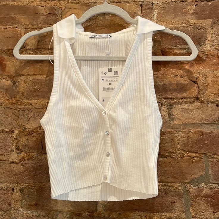 Zara Size Medium Never Worn With Tags White Crop Top Sleeveless Collared Shirt Ribbed Tank Chic Spring Crop Top Vest, Summer White V-neck Vest, White V-neck Summer Vest, White V-neck Vest Crop Top, White V-neck Crop Top Vest, White Sleeveless Crop Top For Day Out, Chic White Vest For Beach, Chic White Beach Vest, Trendy White Summer Vest