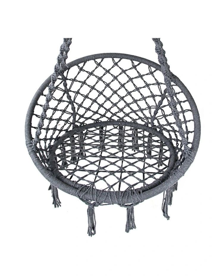 a round chair with tassels on it