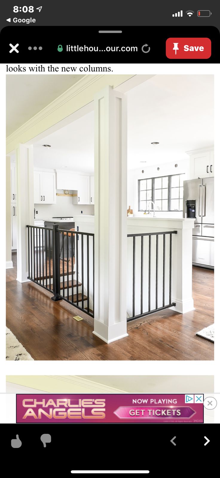 an image of a living room with white walls and wood flooring on the phone