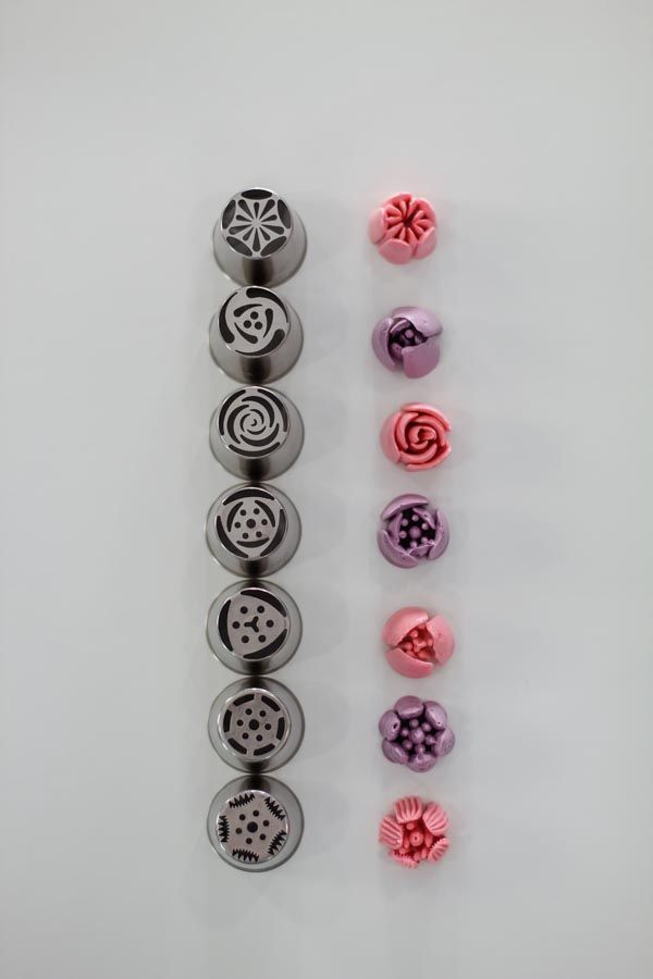 several different types of chocolate molds on a white surface, including one with swirl designs and the other with spiral shapes