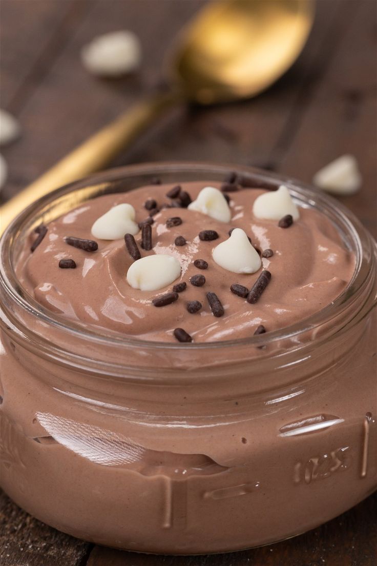 a jar filled with chocolate pudding and marshmallows