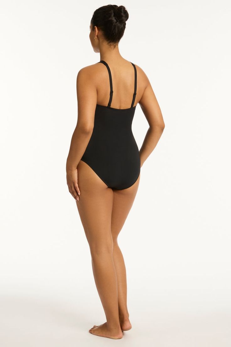 Sea Level Swim is committed to creating collections in the most mindful and sustainable ways. Our swimsuits are made from advanced eco-friendly fabrics which use regenerated nylon yarns derived from pre-consumer waste. These recycled textiles maintain a durable soft feel and premium quality. Best suited for cups A to DD Stretch ladder trim detail Mastectomy friendly Removable soft cups - remove cups to give more depth if you have a larger bust Adjustable and convertible straps - adjust for comfo Elastane Swimwear With Built-in Cups, Solid Swimwear With Built-in Bra, Workout Swimwear With Built-in Bra, Fitted Nylon Swimwear With Built-in Cups, Nylon Swimwear With Built-in Cups For Pool, Stretch Nylon Swimwear With Built-in Cups, High Stretch Black Swimwear With Full Coverage, Black Full Coverage High Stretch Swimwear, Black Full Coverage High-stretch Swimwear