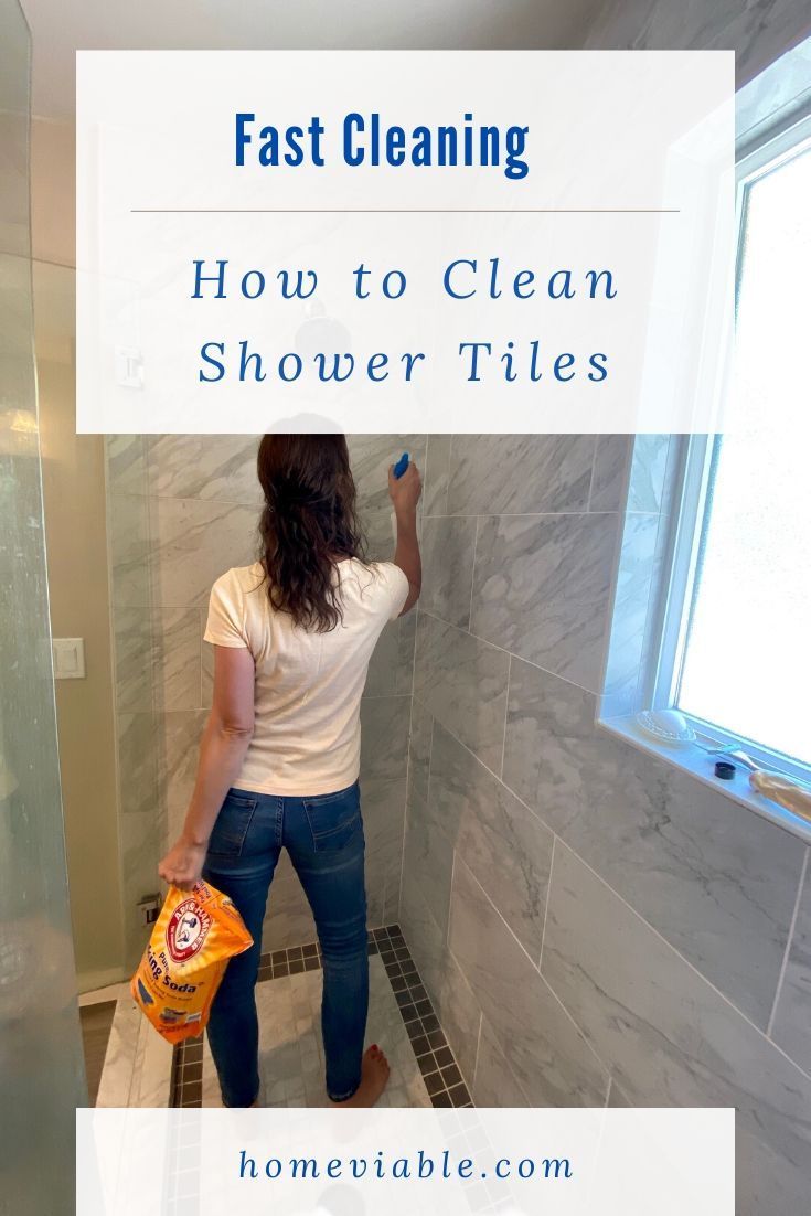 a woman is cleaning the shower tiles in her bathroom, with text overlay reading fast cleaning how to clean shower tiles