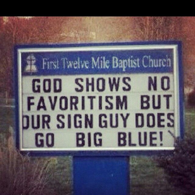 a sign that says god shows no favors but our sign guy does go big blue