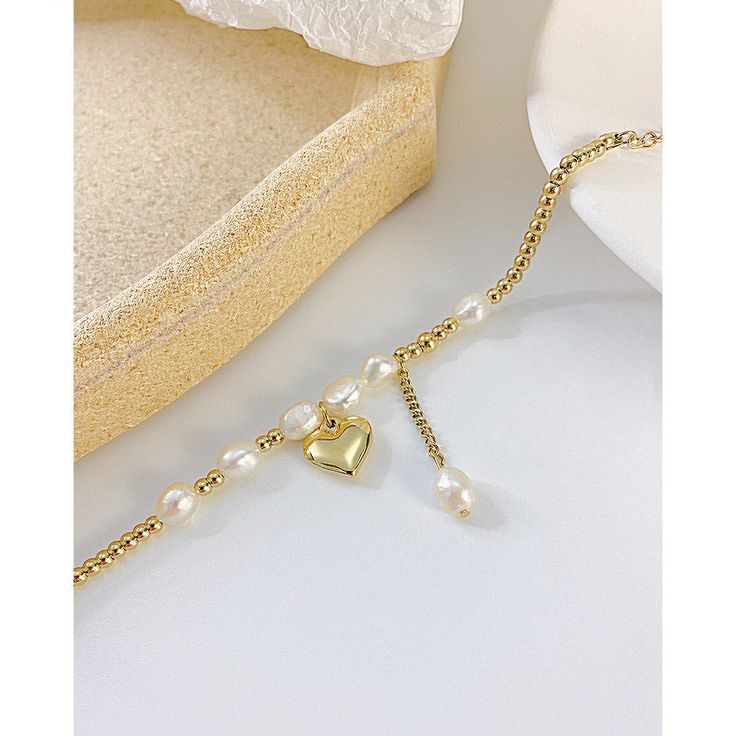 This Natural Pearl Heart Charm Bracelet is a modern style bracelet with anti-allergic and durable finish that makes it blend with any outfit. Pearl Heart, Natural Pearl, Heart Charm Bracelet, Natural Pearls, Heart Charm, Fashion Bracelets, Modern Style, Gold Necklace, Charm Bracelet