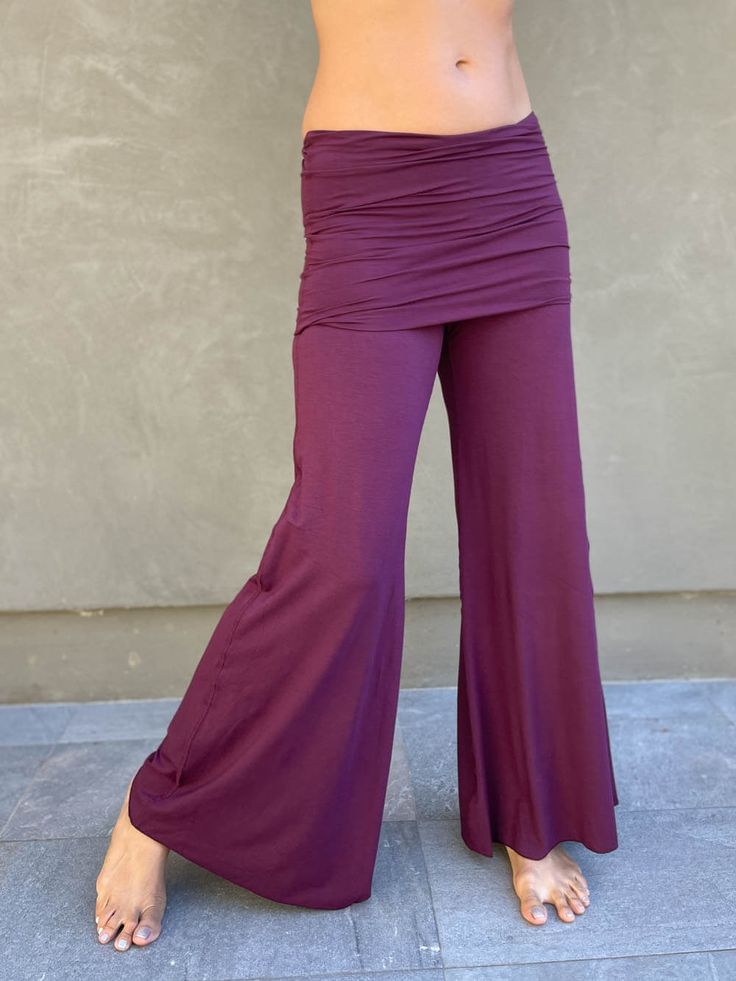 women's natural stretchy rayon jersey skirt-over flow pants #color_jam Versatile Full-length Elastane Yoga Pants, Solid Flare Bottoms With Elastic Waistband, Flared Yoga Bottoms In Solid Color, Casual Wide-leg Elastane Yoga Pants, Flare Yoga Bottoms, Versatile Wide Leg Elastane Pants For Loungewear, Versatile Stretch Harem Pants For Spring, Wide-leg 4-way Stretch Yoga Pants, Stretch Wide-leg Yoga Pants For Fall