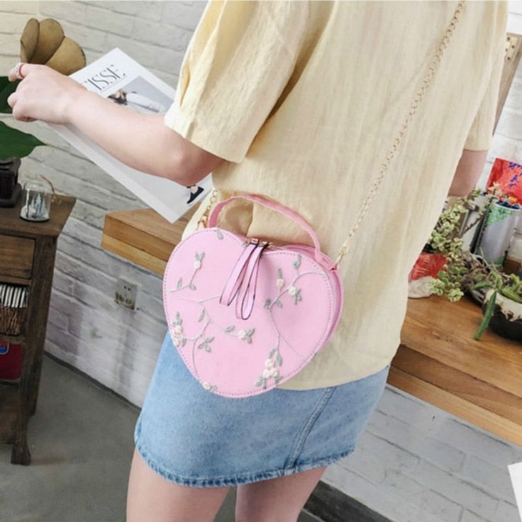 This beautiful heart shaped bag can be used both as a shoulder and as a crossbody bag. The detailed floral embroidery adds a romantic and delicate touch making it perfect as a coquette bag as well as a soft girl bag. Available in 4 different colors. Main Material: PU Faux Leather Cute Valentine's Day Crossbody Shoulder Bag, Heart-shaped Summer Bags For Everyday Use, Heart-shaped Summer Bag For Gifts, Heart-shaped Summer Bags For Gifts, Cute Heart Print Bags, Heart-shaped Summer Gift Bags, Feminine Crossbody Shoulder Bag For Spring, Trendy Heart-shaped Bag For Spring, Feminine Spring Crossbody Shoulder Bag