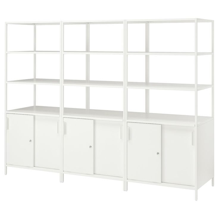 a white bookcase with four shelves and two doors