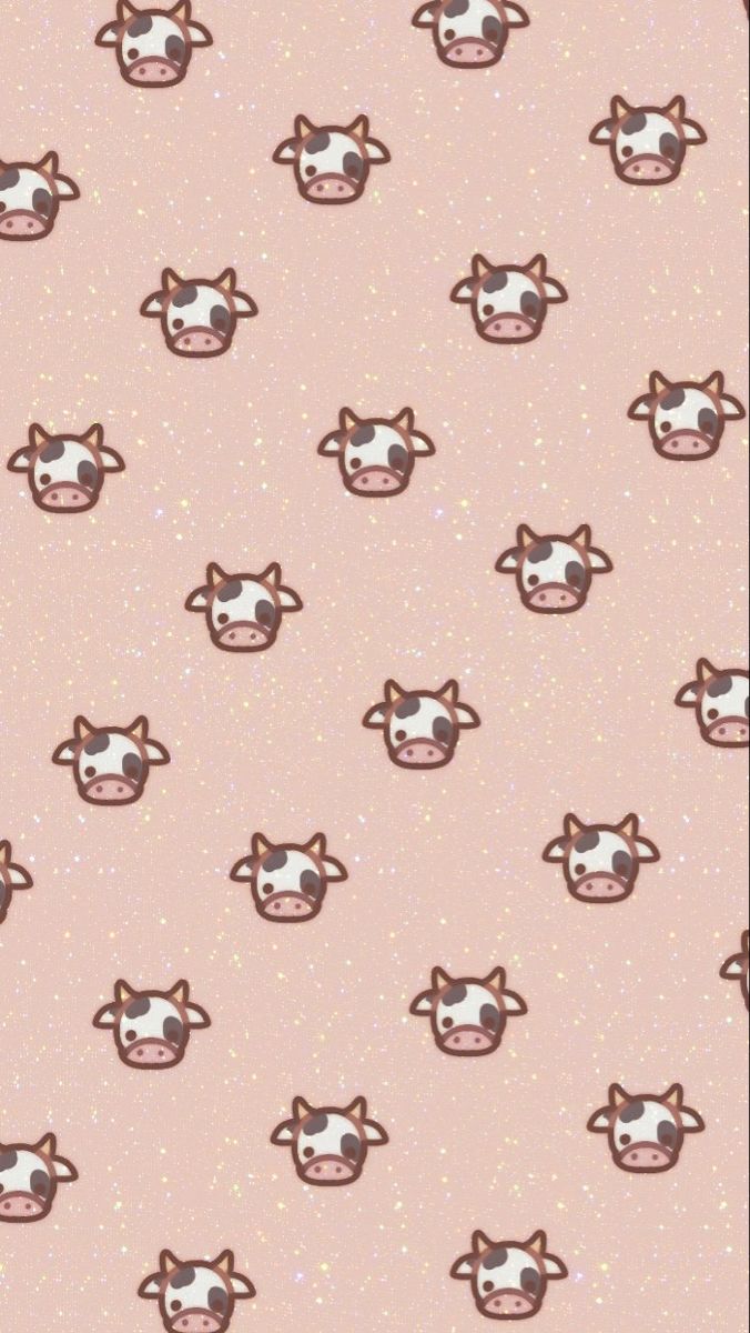 a cow pattern on a pink background