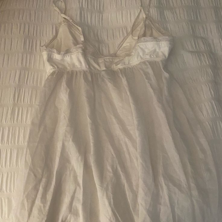 Never Worn Nighty In Excellent Condition. White Sleepwear With Built-in Bra For Spring, White V-neck Tops For Sleepover, Cotton Sleepwear With Built-in Bra, Sheer White Nightgown For Sleepovers, White Sheer Nightgown For Sleepover, Sheer White Sleepwear, Sheer White Loungewear Tops, Bra Friendly Sleeveless Sleepwear, White Sheer Sleepwear For Sleepovers