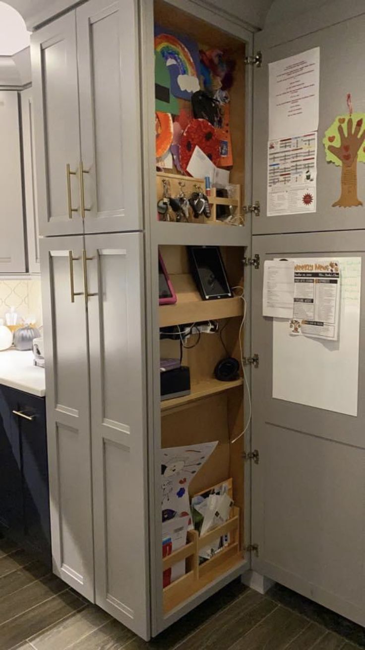 a white refrigerator freezer sitting inside of a kitchen