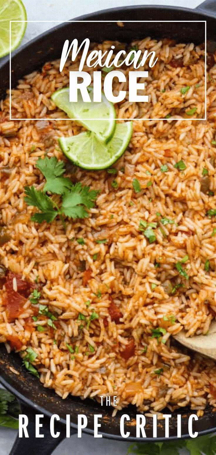 mexican rice in a skillet with limes and cilantro on the side