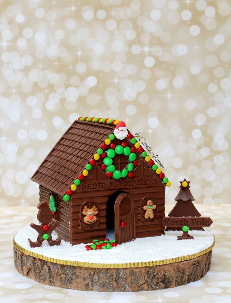 a gingerbread house is decorated for christmas