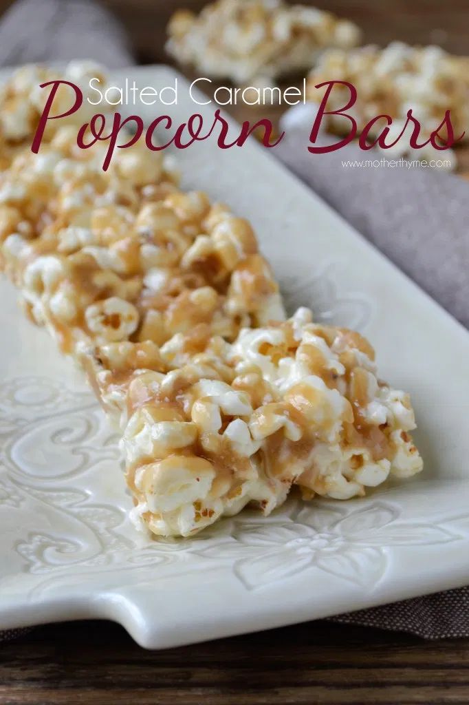 caramel popcorn bars on a white plate