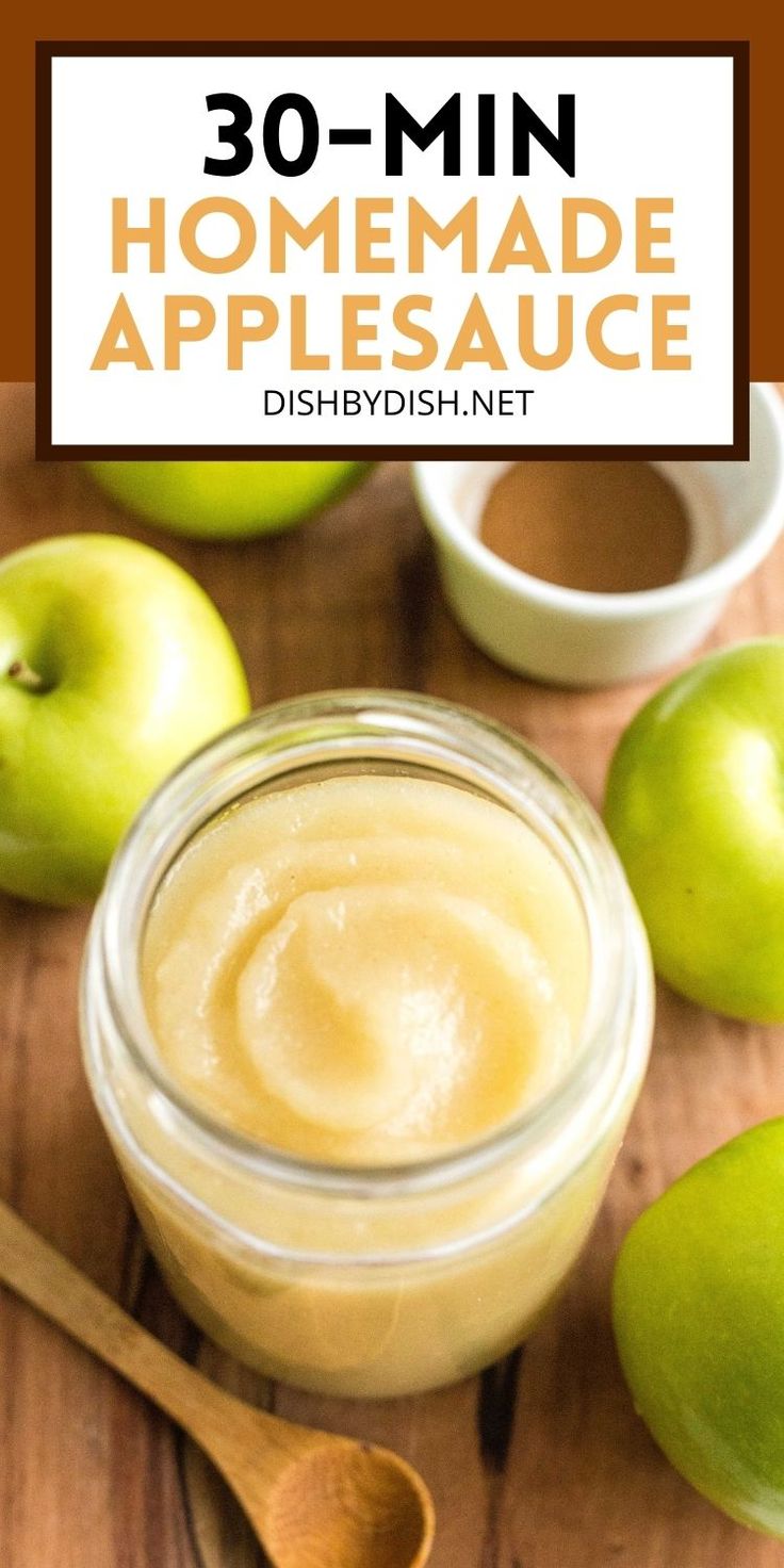 homemade apple sauce in a jar with apples around it