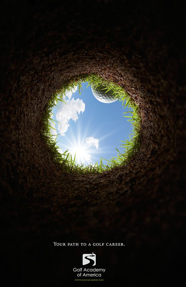 an image of the inside of a hole in the ground with grass and blue sky