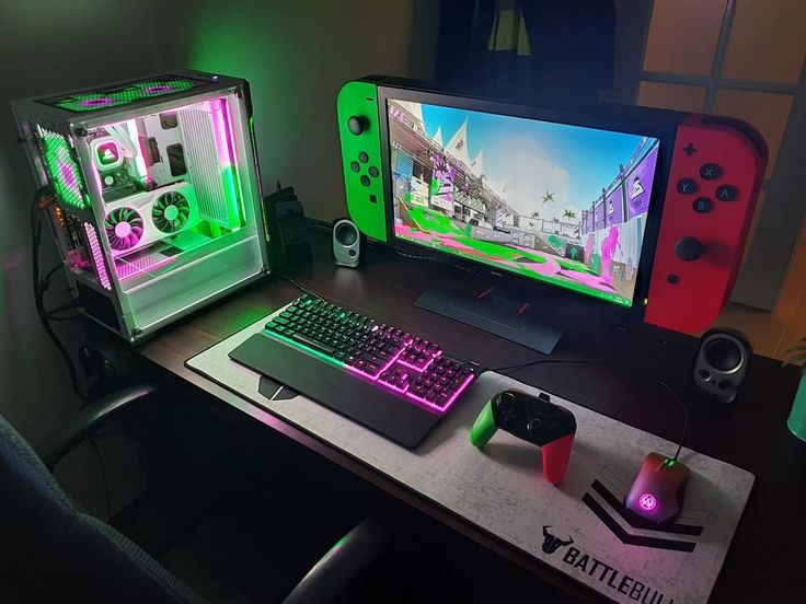 a computer desk with two monitors and a keyboard