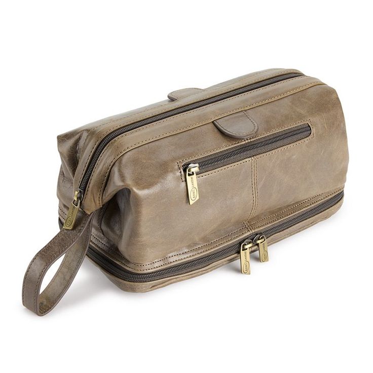 Keep your essentials organized in this fashionable AmeriLeather leather toiletry bag. Keep your essentials organized in this fashionable AmeriLeather leather toiletry bag. DETAILS 6.50"H x 6.75"W x 11.5"D Wrist strap drop: 4" Zipper closure Interior: 1 slip pocket, 1 zip pocket Exterior: 2 zip pockets Water repellentCONSTRUCTION & CARE Body: leather Lining: water proof nylon Wipe clean Imported Size: One Size. Color: Grey. Gender: female. Age Group: adult. Cromwell Gray, Accessories Guide, Leather Toiletry Bag, Bag Details, Leather Wallets, Toiletry Bag Travel, Bag Travel, Water Proof, Wrist Strap