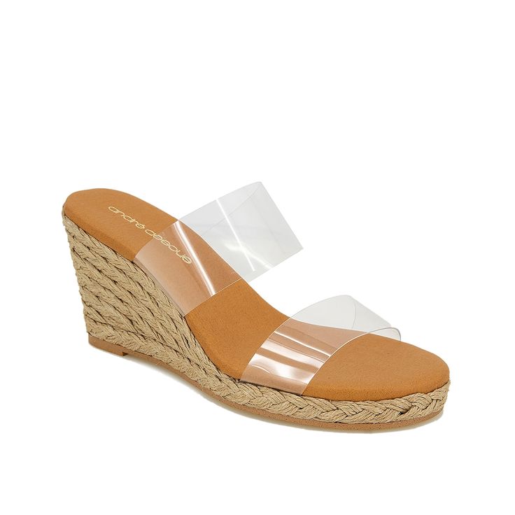 Andre Assous-Bella Wedge Sandal Carry a style to impress donning the Bella wedge sandal by Andre Assous. The gorgeous profile flaunts transparent vinyl straps set on cushioned footbed for extra comfort. The jute-wrapped espadrille heel adds a classic flair to the modern design. Synthetic Wedge Sandals With Translucent Outsole And Round Toe, Wedge Sandals With Clear Strap, Summer Sandals With Clear Strap And Wedge Heel, Summer Wedge Sandals With Clear Strap, Modern Wedge Sandals With Cushioned Footbed For The Beach, Spring High Heel Wedge Sandals With Clear Strap, Clear Closed Toe Synthetic Sandals, Summer Wedge Heel Sandals With Clear Strap, Synthetic Closed Toe Sandals With Clear Strap