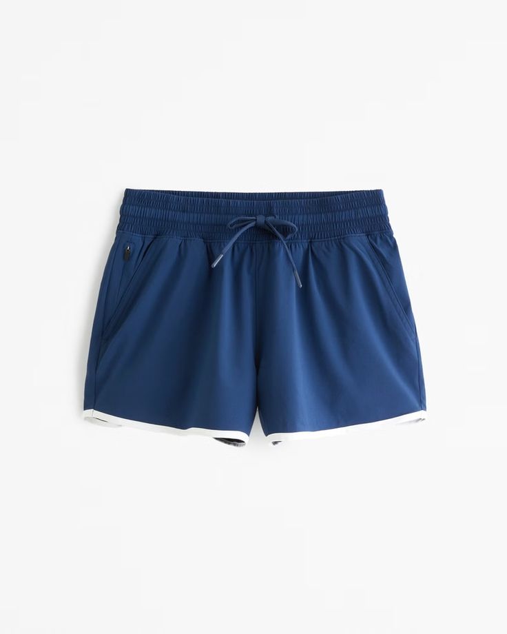 Women's YPB motionTEK High Rise Lined Workout Short | Women's Active | Abercrombie.com Blue 4-way Stretch Athletic Shorts For Athleisure, Blue Moisture-wicking Athletic Shorts With Relaxed Fit, Navy Activewear With Built-in Stretch Shorts, Blue 4-way Stretch Athletic Shorts, Blue Athletic Shorts With 4-way Stretch And Elastic Waistband, Workout Shorts Women, Workout Short, American Clothing, Active Women