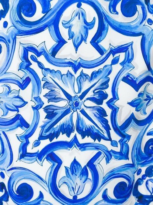 an artistic blue and white tile design