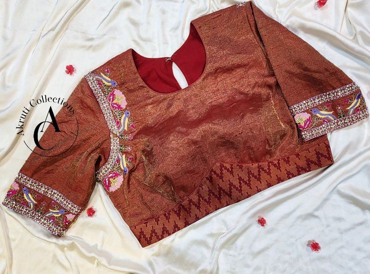 Material: 70 grams Silk, Net. Blouse Size: Can be customized as per your size. Color customization is available. For more details contact us on support@akruticollections.com or WhatsApp +91 9052550550 Price may vary depending on the fabric selection. Fitted Silk Top With Handwork, Silk Blouse Piece With Handwork Fitted, Fitted Silk Blouse Piece With Handwork, Fitted Blouse With Handwork For Festive Occasions, Fitted Bollywood Blouse With Handwork, Elegant Designer Handwork Tops, Designer Raw Silk Fitted Blouse, Elegant Designer Tops With Handwork, Designer Festive Unstitched Blouse