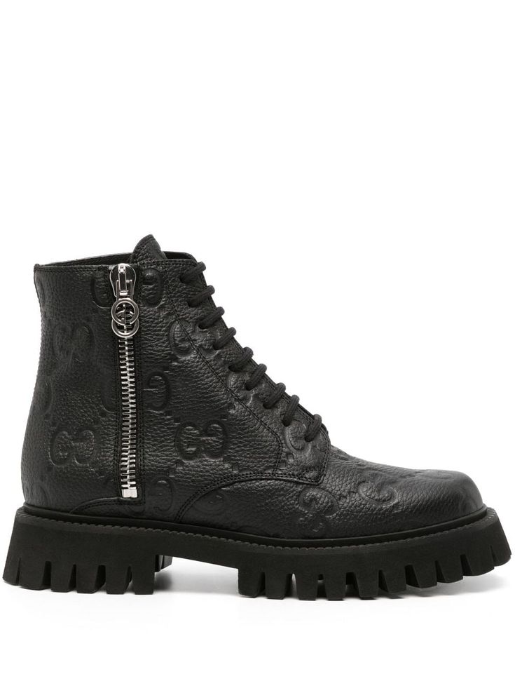 black calf leather grained texture all-over debossed logo branded zip puller round toe front lace-up fastening side zip fastening branded leather insole rubber lug sole ankle-length Luxury Lace-up Boots With Reinforced Snip Toe, Luxury Classic Lace-up Boots With Almond Toe, Luxury Fitted Lace-up Boots With Round Toe, Gucci Combat Boots, Gucci Ankle Boots, Ranger Boot, Black Boots Men, Gucci Boots, Boots Chunky