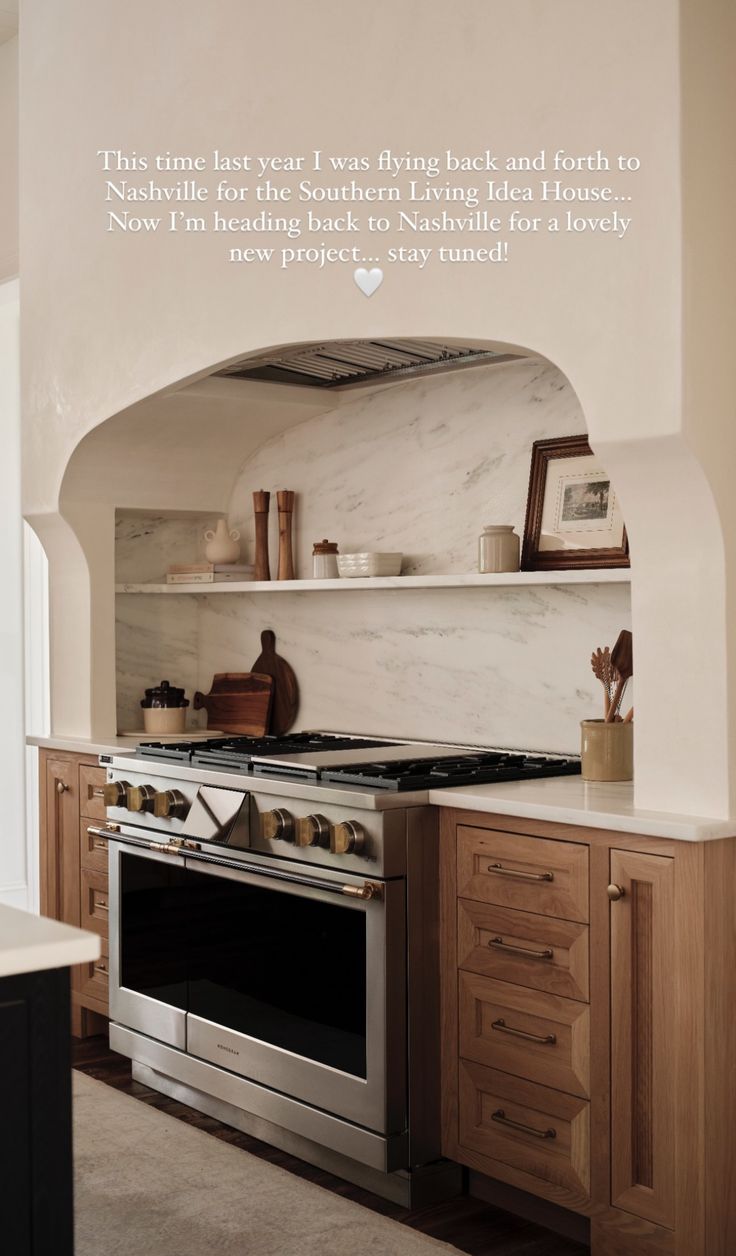 a kitchen with an oven, stove and shelves on the wall that have words above it