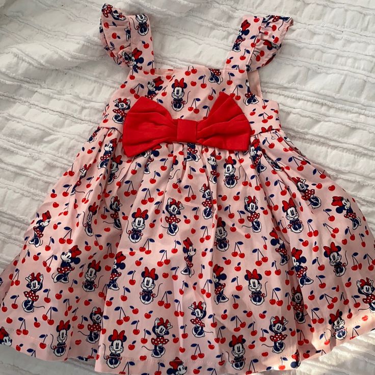 Nwt Disney Baby Minnie Mouse Dress Excellent Condition Never Been Worn Comes With Matching Cardigan Playful Minnie Mouse Summer Dress, Playful Minnie Mouse Fitted Dress, Playful Fitted Minnie Mouse Dress, Disney Minnie Mouse Cotton Dresses, Playful Minnie Mouse Dress-up Dress, Playful Minnie Mouse Dress For Dress-up, Playful Minnie Mouse Short Sleeve Dress, Cute Minnie Mouse Spring Dress, Playful Short Sleeve Minnie Mouse Dress