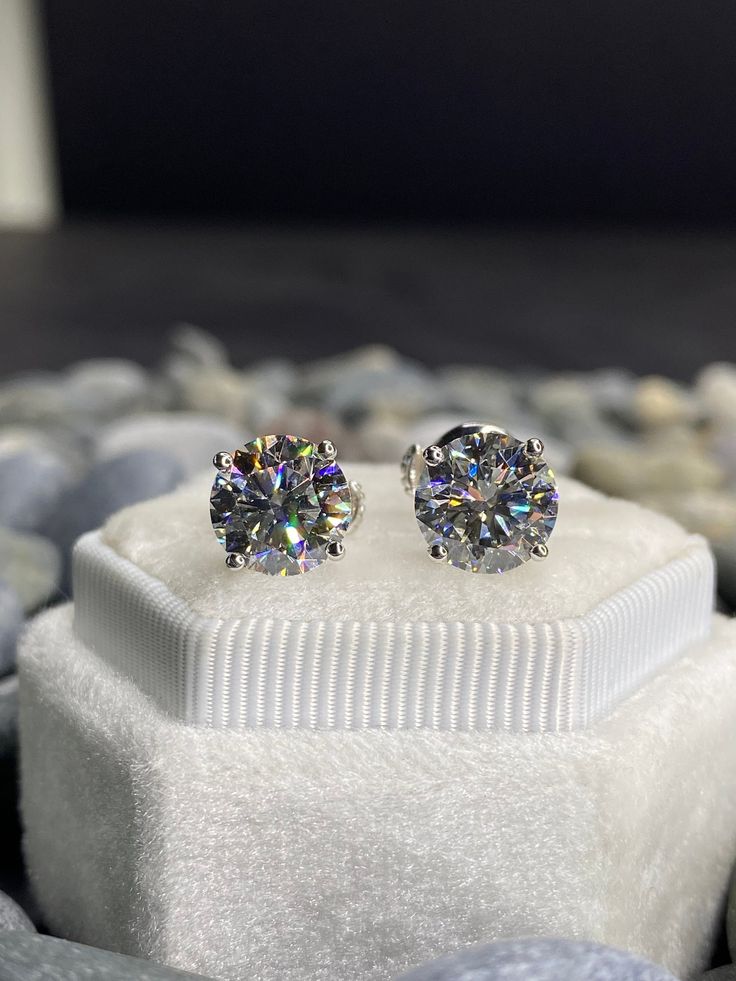 Round cut diamond earrings, lab grown diamond , 14K white gold, alpha backs, 4 prongs Center Stone: Lab grown diamonds Carat weight: 4.18 carat Clarity: VVS2 Color: F Shape: Round cut LAB-09 LAB-10 All products come with a SGL Certificate. Total Carat Weight: 4.18 Carats Metal: 14K white Gold To make your decision easier we offer: -30-Day Returns -100% Full Refund. - Handmade Custom Design -free luxury gift box -100% secure Online Shopping. Our goal is to provide our customers with the best prod Lab Grown Diamond Earrings With Prong Setting, Diamond Cut 14k White Gold Diamond Earrings, Silver Classic Cut Lab Grown Diamond Jewelry, Fine Jewelry Moissanite Diamond Cut Earrings, Silver Jewelry With Classic Cut Lab Grown Diamond, White Gold Moissanite Diamond Earrings, Round Cut Lab Grown Diamond Earrings With Prong Setting, Brilliant Cut Moissanite Diamond Earrings, White Cubic Zirconia Classic Cut Jewelry