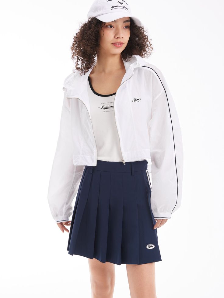 Details: Girly Pleated Skirt In NavyBuilt-in shorts for a discreet summer lookStriped webbing at the side for a vintage college look. Materials & Care: Fabric: Polyester 100%.Lining: nylon 92.4 %Spandex 7.6 % Hand wash | Dry clean Do not bleach Size & Fit: Model is 5'7", Bust 32, Waist 24, Hips 35, wearing a size S Item #: SN2SK10 College Looks, Chic Business Casual, Denim Jean Dress, Style Sportif, Clear White, Sports Jacket, White Casual, Shirt Sale, Skirts For Sale