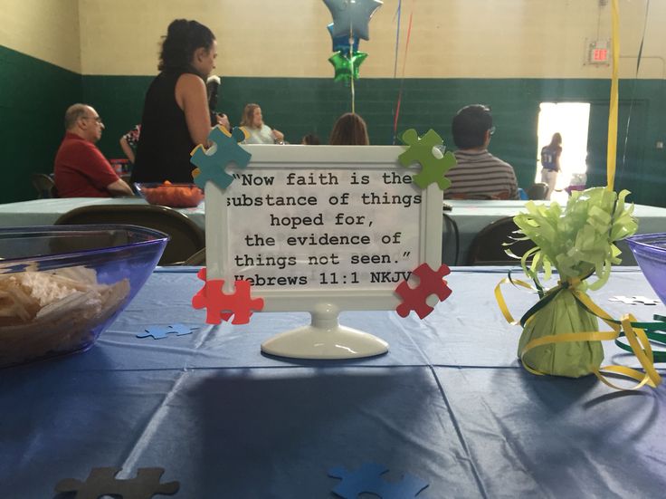 a table with a sign that says how faith is the substance of things hope for, the evidence of things not seen