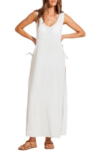 You'll feel like a vintage starlet when you're walking along the beach in this linen-and-cotton dress with an open side that dramatically catches the breeze. 54" length (size X-small) Side ties Deep V-neck Sleeveless 80% linen, 20% cotton Hand wash, dry flat Imported Linen Maxi Dress For Beach Cover-up, Beach Linen Dress With Side Slits, Linen Beach Dresses With Side Slits, Vacation Linen Maxi Dress With Tie Back, Cotton Beachwear Maxi Dress For Daywear, Linen Maxi Dress With Tie Back For Vacation, Summer Linen Sundress For Vacation, Beachwear Maxi Dress With Tie Straps, Cotton Maxi Dress For Beach Daywear