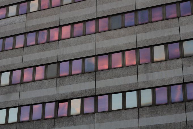 the side of a building with many windows