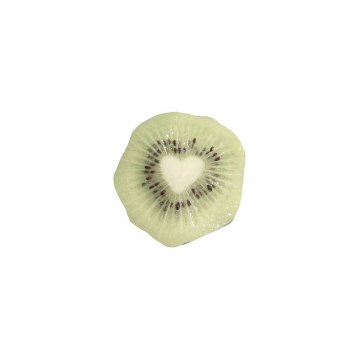 a kiwi cut in half on a white background