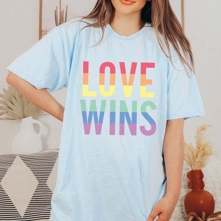 Love Wins Graphic Tee - Limeberry Designs Relaxed Fit Crew Neck T-shirt For Pride, Pride Graphic Tee With Slogan, Fun Blue T-shirt With Slogan, Pride Funny Print Crew Neck T-shirt, Fun Blue Tops With Slogan, Pride Graphic Print Crew Neck Top, Cotton Slogan T-shirt For Pride, Pride Graphic Tee With Letter Print, Pride Letter Print Crew Neck T-shirt