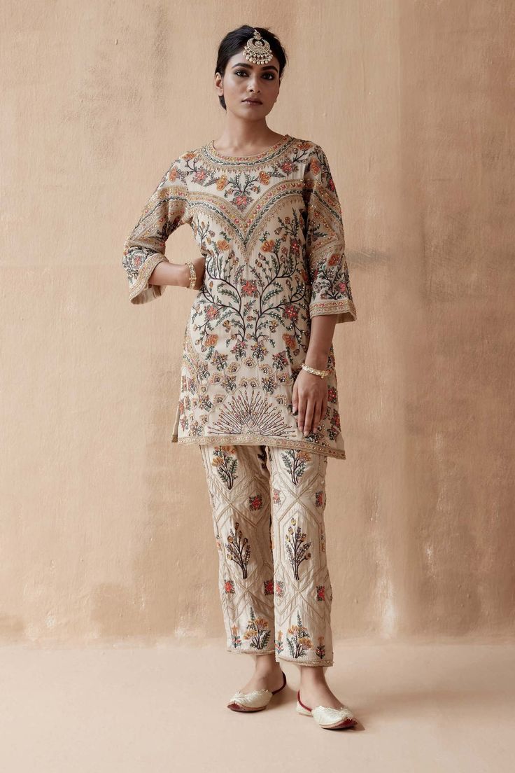 Aman Takyar | Ivory Floral Embroidery Kurta And Pants | INDIASPOPUP.COM Luxury Embroidered Ceremonial Kurta, Luxury Palazzo Set With Floral Embroidery For Diwali, Luxury Bohemian Traditional Wear With Floral Embroidery, Luxury Kurta With Geometric Embroidery For Navratri, Luxury Floral Embroidered Straight Kurta Set, Luxury Gold Palazzo Set With Intricate Embroidery, Luxury Embroidered Unstitched Suit For Navratri, Luxury Embroidered Lawn Suit For Navratri, Luxury Straight Kurta With Floral Embroidery