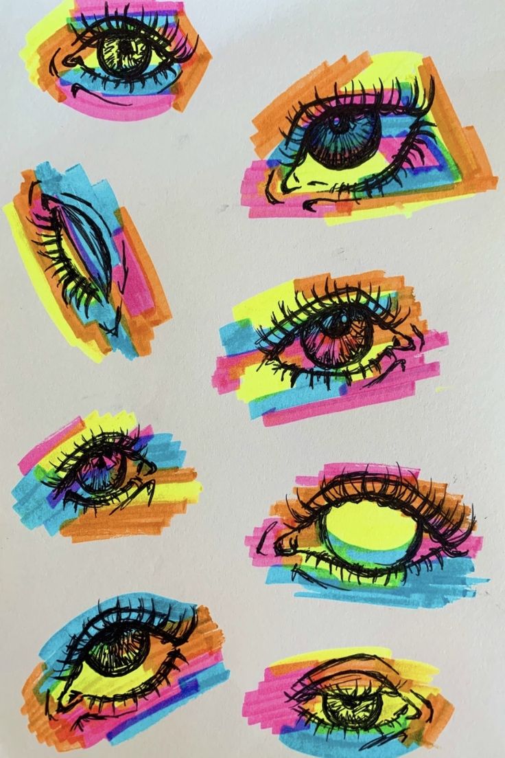 an art project with different colored eye shapes and colors on the side of each eye