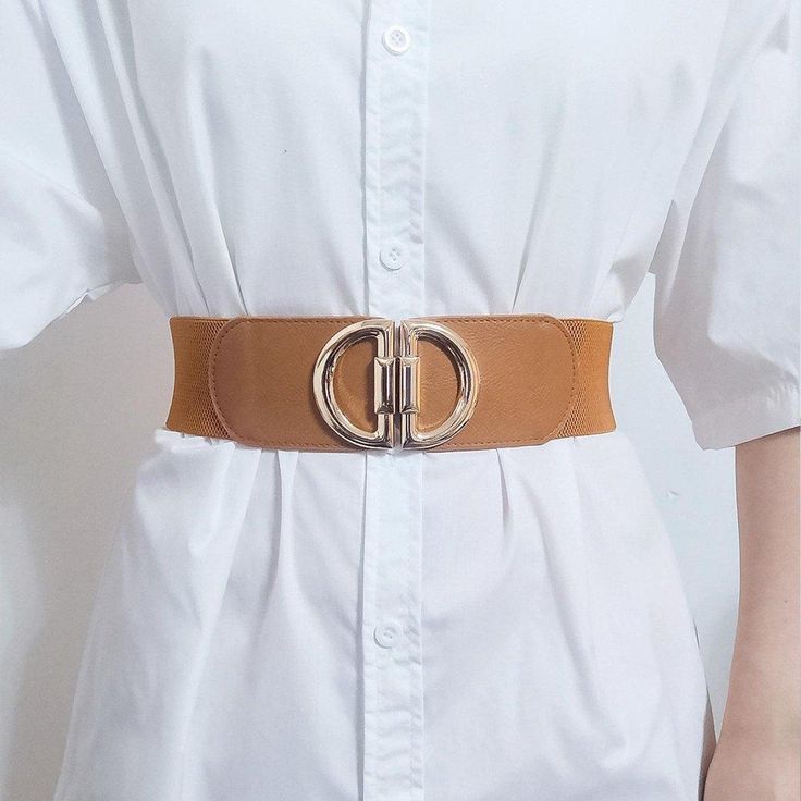 Add an elegant yet practical touch to your outfit with this elastic belt for women. Featuring elastic fabric and a gold buckle, this belt's 6 cm width creates a striking visual effect and a chic contrast. Enhance your style with this functional and modern accessory. Western Leather, Waist Dress, Luxury Brand, Ramadan, Luxury Branding, Buckle, Elastic, Leather