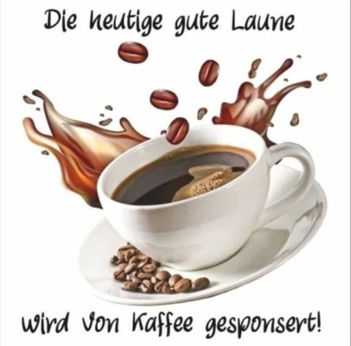 a cup of coffee and beans on a saucer with the words de neutge gute laune