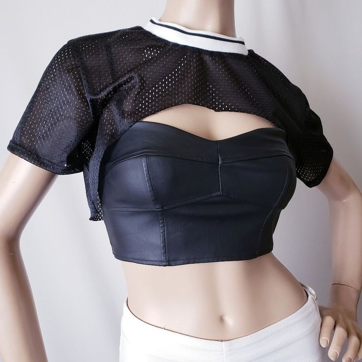 New With Tags. Lightweight Athletic Mesh Crop Top. Features Black & White Ribbing At The Neck. Cropped Above The Chest. Raw Edges At The Bottom. Can Be Worn With Just About Anything. * Only Crop Top Included. 100% Polyester Black Cropped Tops For Club, Black Crop Top For Club, Black Crop Top For Club In Spring, Trendy Black Crop Top For Night Out, Black Crop Top For Spring Night Out, Black Tops For Club Nights In Spring, Black Crop Top For Summer Night Out, Futuristic Top, Goth Crop Top