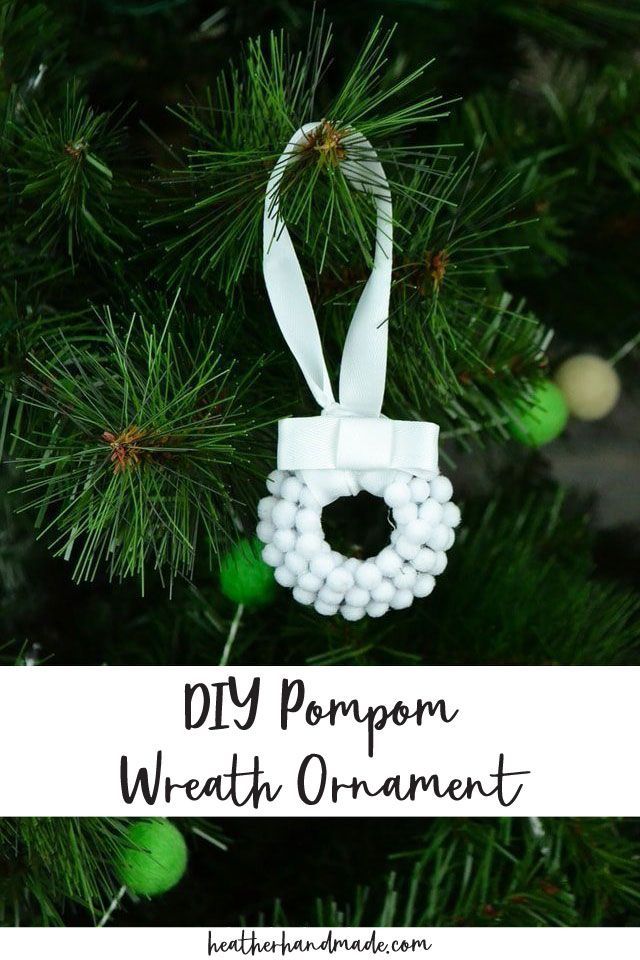 an ornament hanging on a christmas tree with the words diy pompom ornament