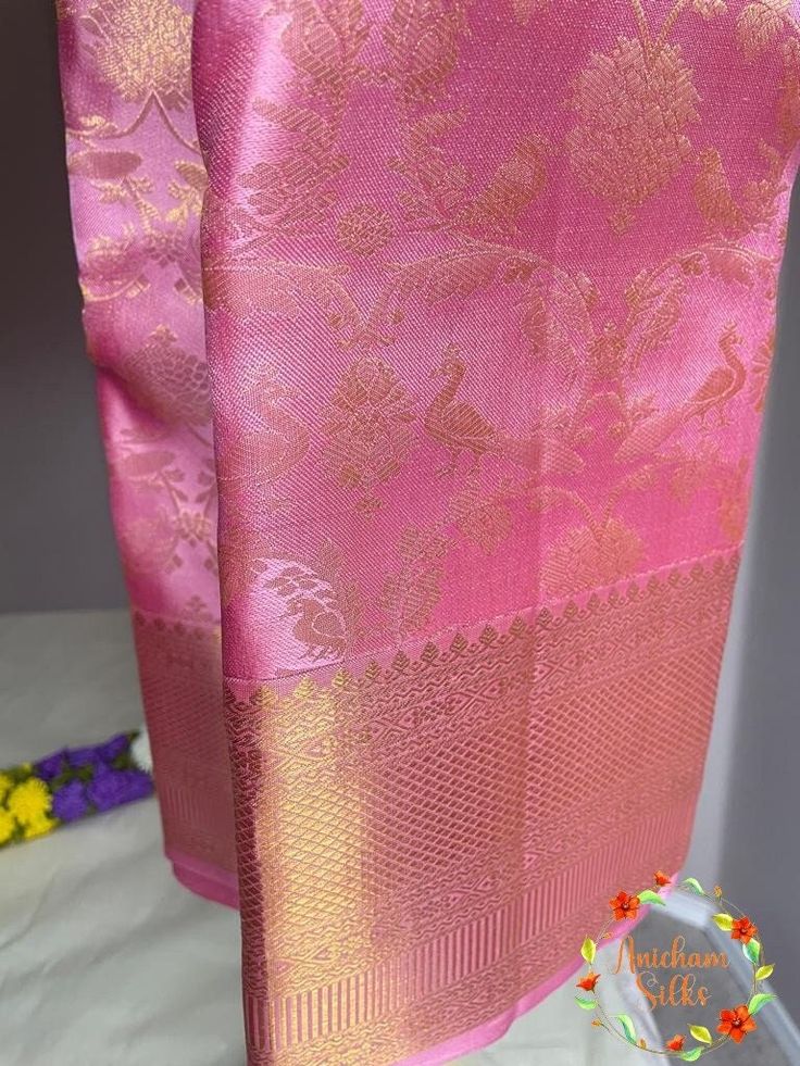 Pretty baby pink kanjeevaram pure silk saree. The body is intricately woven in motifs of parrot and peacock in gold zari by our master weavers. The lower and upper body are of same width. comes with a rich pallu and a brocade woven running unstitched blouse piece. saree width :49 inch Blouse fabric: 1.2 * 0.8 m Maintenance: Dry wash advisable Returns and refund only accepted on defective products. Product should be shipped back in 3 days after delivery. Please go through our return policies belo Pink Raw Silk Traditional Wear For Ceremonies, Pink Traditional Silk Mark Certified Wear, Pink Silk Mark Certified Traditional Wear, Elegant Pink Art Silk Traditional Wear, Pink Paithani Silk Traditional Wear Handloom, Pink Silk Mark Certified Traditional Wear For Diwali, Pink Silk Mark Certified Saree, Silk Mark Certified Pink Saree, Pink Handloom Raw Silk Traditional Wear