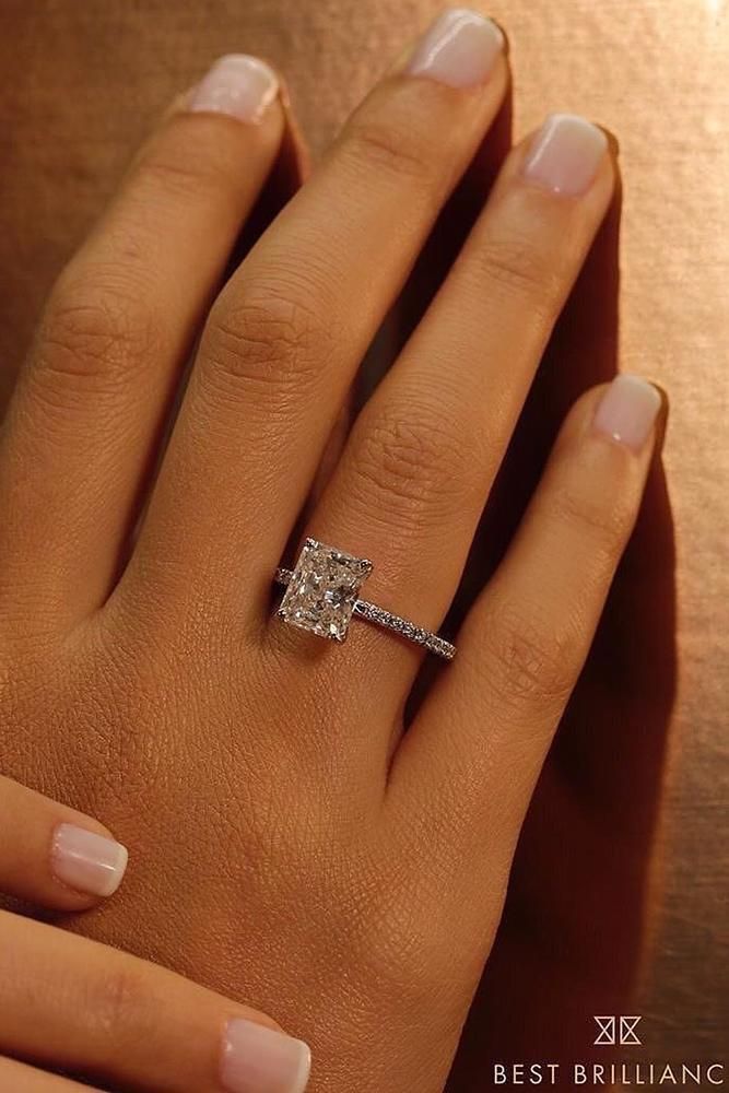 a woman's hand with a diamond ring on top of her finger and the words best bridal