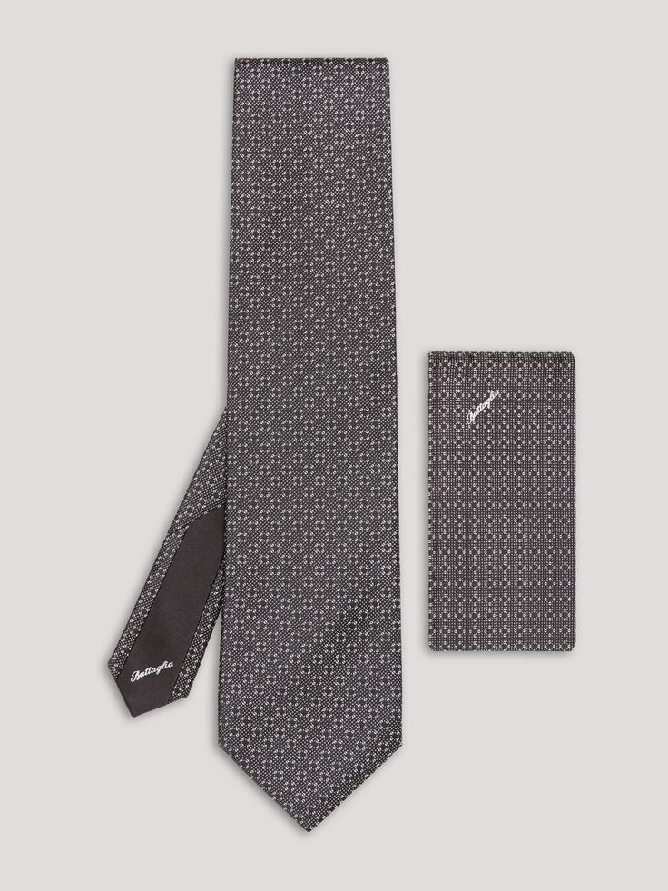 Grey and silver silk tie with handkerchief. Designer Ties For Black Tie Events, Designer Formal Suit And Tie Accessories, Luxury Ties For Black Tie Events, Designer Ties For Formal Occasions, Luxury Fitted Silk Suit And Tie Accessories, Designer Suit And Tie Accessories For Semi-formal, Luxury Business Suit And Tie Accessories, Formal Silk Suit And Tie Accessories With Pocket Square, Elegant Silk Mark Certified Suit And Tie Accessories