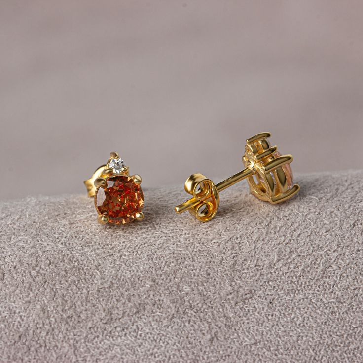 Citrine stone; The natural stone, known as the stone of success or money, is believed to bring money, abundance and fertility for centuries. Dazzle with opulence with these timeless pieces, elegantly designed to enhance your look. Precisely crafted and studded with real diamonds, these earrings are a true testament to luxury. Elevate your style and captivate your hearts with the charm of citrine and the brilliance of diamond. Trust the quality of 14K gold and pamper yourself with a sophisticated touch. Citrine is the birthstone for those born in November. 🤍🤍 Special gifts for your special moments. We produce our jewelery for you in the most perfect way. 🤍🤍 All of our products are made of 14K Solid gold. FEATURES * Sold as Single or Pair * Gold Color Selection: Yellow Gold, Rose Gold, W Orange Brilliant Cut Jewelry For Gift, Gold Gemstone Diamond Earrings For Anniversary, Gold Cubic Zirconia Earrings With Gemstones, Gold Diamond Gemstone Earrings For Anniversary, Yellow Gold Diamond Earrings With Birthstone, Yellow Gold Topaz Earrings, Round Shape, Gold Diamond Gemstone Earrings For Gifts, Yellow Gold Diamond Earrings With Birthstone For Anniversary, Yellow Gold Gemstone Diamond Earrings Gift