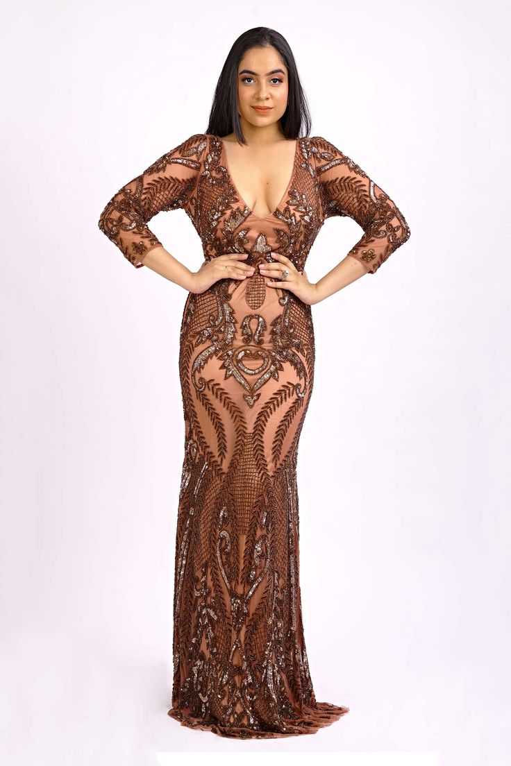 Brown gown highlighted with intricate embroidery, plunging neckline and deep U-back.
Components:1
Embroidered
Neckline:V-neck
Sleeve Length:Three Quarter
Color:Brown
Fish cut out fall gown
Concealed zip closure at the back - Aza Fashions Fish Cut Outs, Fish Cut Gown, Brown Gown, Fish Cut, Embroidered Fish, Brown Embroidery, Gown For Women, Ladies Gown, Embroidered Neckline