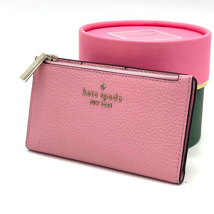 Brand New With Tag Kate Spade Leila Small Slim Bifold Wallet Product Details Color: Bright Carnation 3.1" H X 5.5" W X 0.9" D Pebbled Leather Ksny Metal Pinmount Logo Two Way Spade Jacquard Lining Interior: 5 Credit Card Slots, Id Window, 2 Slip Pockets Exterior: Top Zip Coin Compartment On Front Of Wallet Snap Closure Dust Bag Not Included Imported Pink Rectangular Feminine Wallet, Pink Feminine Rectangular Wallet, Pink Feminine Wallet For Everyday Use, Feminine Pink Wallet For Everyday Use, Feminine Pink Wallets For Daily Use, Pink Feminine Wallet For Everyday, Feminine Pink Wallet, Pink Coin Purse With Interior Card Slots, Pink Kate Spade Wallets With Card Slots